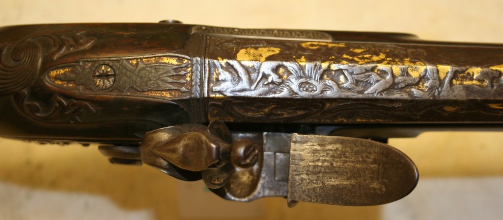 Carved and gold inlaid barrel